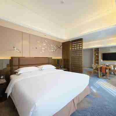 Li Cai Tian Qi Hotel Rooms