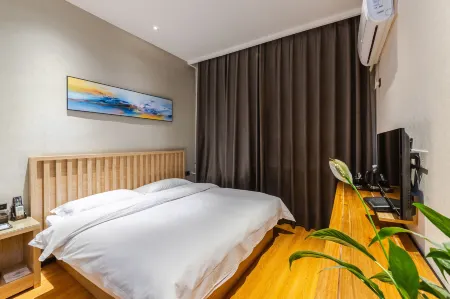 Future Yiju Shanghui Hotel (Zhengzhou Manhadun Yanzhuang Metro Station) Отели рядом с достопримечательностью «Henan University of Technology Gymnasium»