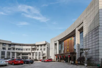 Huanghua Yiguan Hotel Отели в г. Гаою