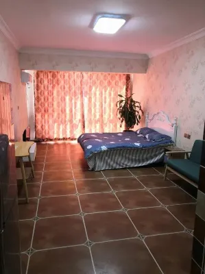 Zhuanghe Qinglian Hotel Apartment Hôtels à : Zhuanghe North Station