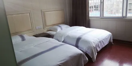 Guzhang Pingji Hotel Отели в г. Гучжан