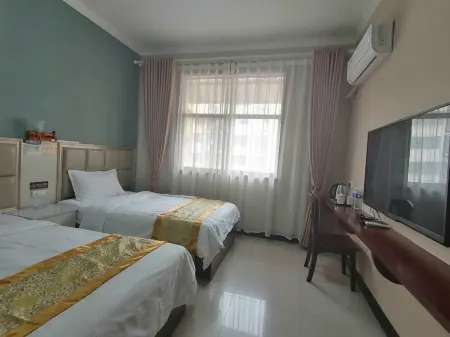 Xinxin Hotel (Xiping County Government Branch) Отели в г. Сипин