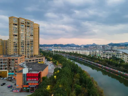 Huaqi International Hotel Отели в г. Сюньву