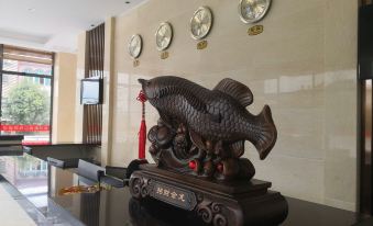 Lingshan Xinde Business Hotel (Xinwei Town Branch)