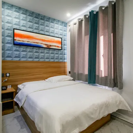 Daqing Boger Hotel (Xinmate Store)