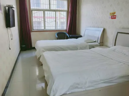 Langzhong Yanwei Guest House Отели рядом с достопримечательностью «Center Square»