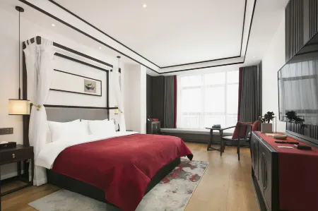 Qianna Hotel (Michi Railway Station County Government) Отели в г. Мяньчи