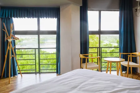 Xihu Zeai Home Отели рядом с достопримечательностью «Yuanmiao Temple»