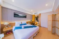 Soaring Dragon Tea Culture Hotel (Hanzhong High-speed Railway Station Wanbang Flagship) - Pet friendly