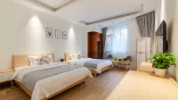 Floral Hotel Shuxiang Yunyin Hotel (Taoyangli Branch, People's Square, Jingdezhen)