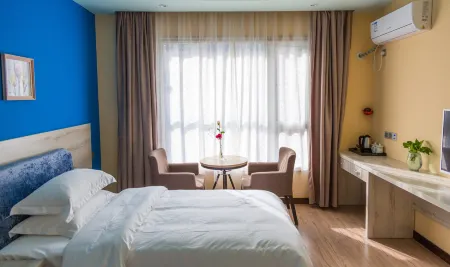 Jieyi Xichong Hotel Отели в г. Сичун