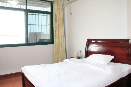 Wenxin Business Hotel (Minhou Nanyu Town) Отели рядом с достопримечательностью «Qishan Wanfo Temple»