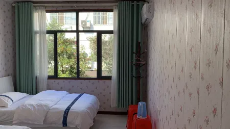 Mulan Prairie Hostel Отели рядом с достопримечательностью «Mulan Grassland»