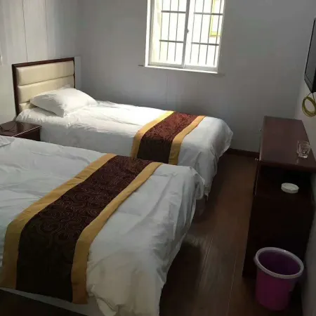 Xinjia Business Hotel