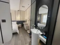 Xingping Xiaoai Hotel (Air Plaza) - โรงแรมราคาถูก