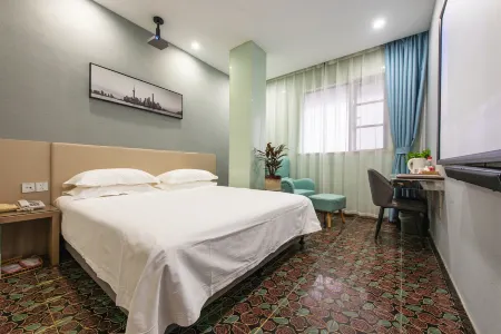 Aixiang Hotel (Shanghai Songhong Road Subway Station) Отели рядом с достопримечательностью «Xinjing Park»