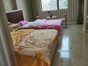 Wanxing Apartment Hotel