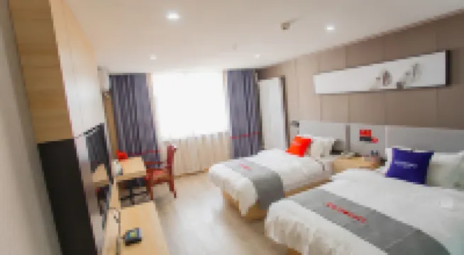 Junyi Hotel (Mengzhou Bus Station)
