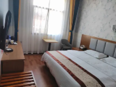 Linfeng Hotel Hoteles en Huize