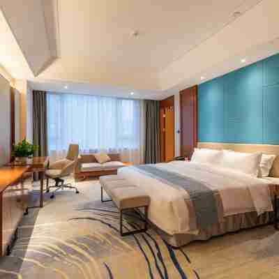 上饒嘉萊特沁廬酒店（近萬力時代） Rooms