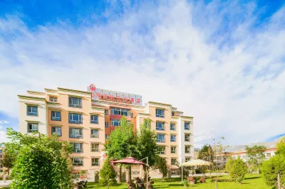 Padma Chumig Garden Hotel Hotels near Baiguoyuan Fruit Supermarket