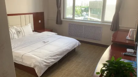 Xinyi Business Hotel Отели в г. Чжоулу