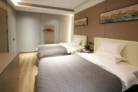 Yaqi Business Hotel (Jiang'an Hospital) Отели рядом с достопримечательностью «Colorful Waterfall»