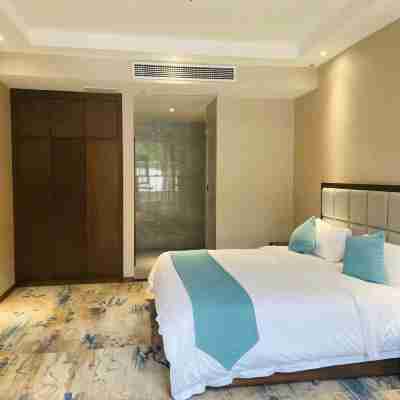 Xinqi Zhouji Hotel Rooms