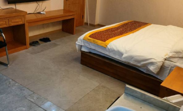 Guojin Business Hotel - Housity