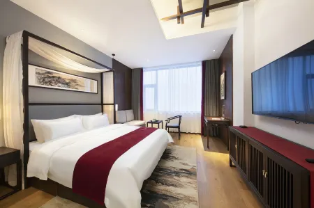 Qianna Hotel (Xiangcheng Yingbin Avenue) Отели рядом с достопримечательностью «Nandun Ancient City»