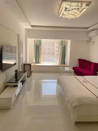 Warm Homeland Apartment Отели рядом с достопримечательностью «Парк Северного озера Чанчунь»