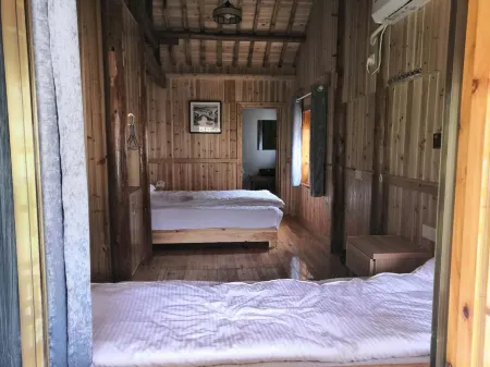 Xiuning Gujia Homestay Отели рядом с достопримечательностью «Zuyuancun»