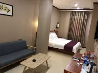 Tianyiyuan Business Hotel Hôtels à : Zhecheng