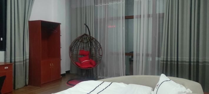 Malipo Xinyi Hotel Hotele w: Powiat Malipo