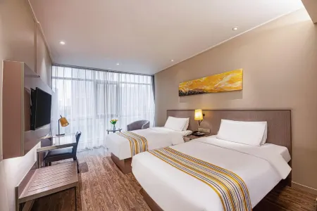 Homeinn Plus Hotel (Kunshan Beimeng Road Jiufang City) Отели рядом с достопримечательностью «Kunshan Gymnasium»