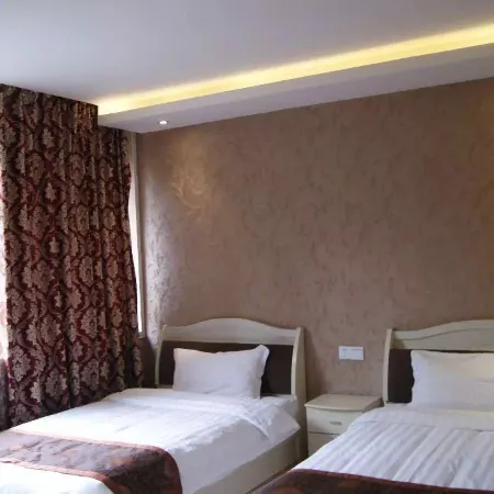 Guyu Yaxin Business Hotel
