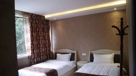 Guyu Yaxin Business Hotel