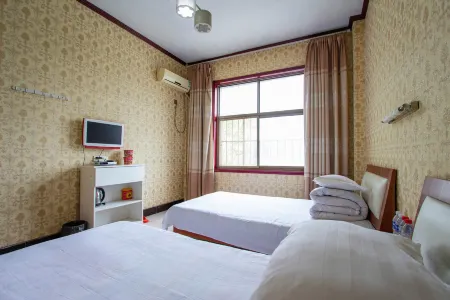 Huixian Zhongyi Inn Отели в г. Хуэйсянь