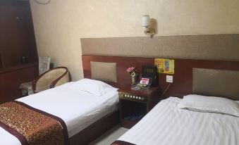 Zhouqu Home Inn Business Hotel