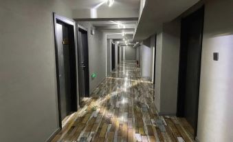 Pebble Motel Hotel (Chaoyang Beipiao Passenger Station)