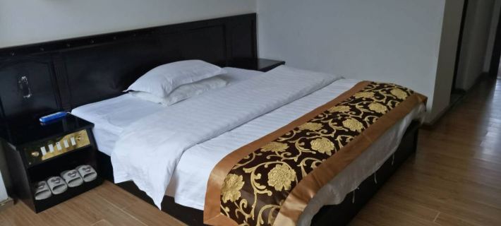 Longling Huanglong Hotel Hotéis em Condado de Longling