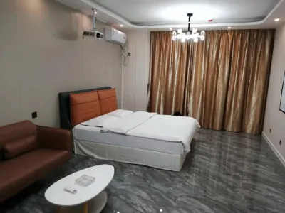 Panjin Xiaoshidai Hotel Apartment Отели в г. Wanda Plaza