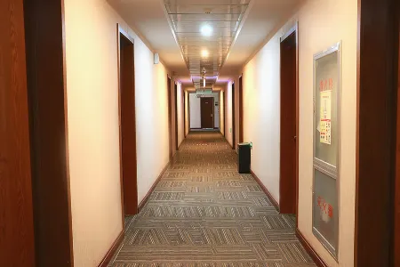 City 118 Selected (Jinan Zhangqiu University Town Yulan Garden Shop) Отели рядом с достопримечательностью «Jinan Engineering Vocational and Technical College (Xiuyuanhe Campus)»