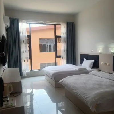 Maitreya Toho Hotel Hotels near Mile Railway Station
