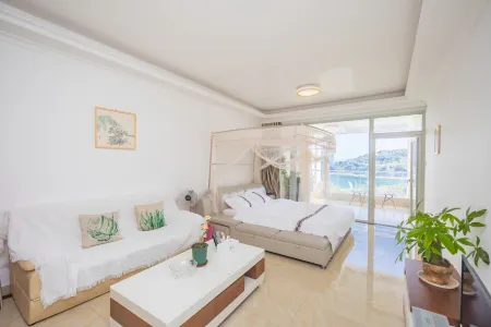Dameishahai World Invincible Seaview Apartment Hotel