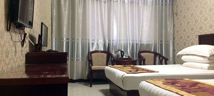 Lingbao Juxinyuan Business Hotel โรงแรมในหลิงเป่า