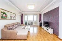 Yingkou Yipinge Seaview Apartment (Bayuquan Shanhai Square) - ติดทะเล