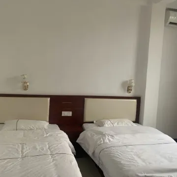 Ningming Shaoxiong Hotel