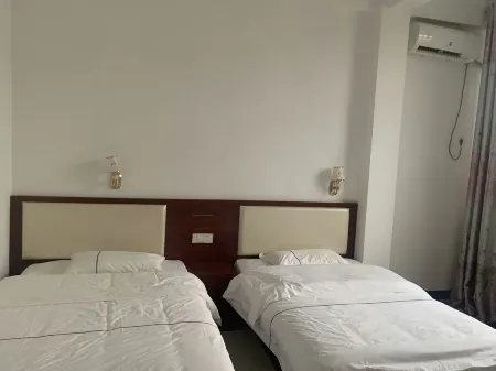 Ningming Shaoxiong Hotel