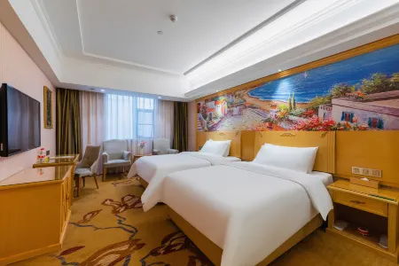 Vienna Hotel (Duyun Wanda Plaza) Отели в г. Дуюн